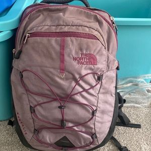 Purple north face book bag